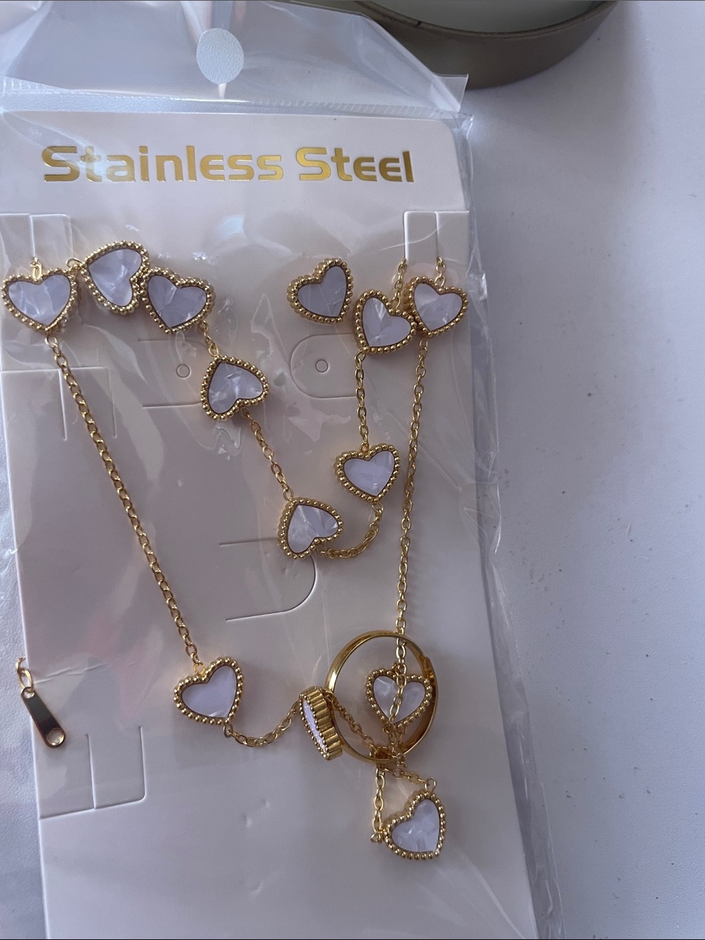 Gold Stainless Steel Heart Link Necklace with White Enamel Hearts